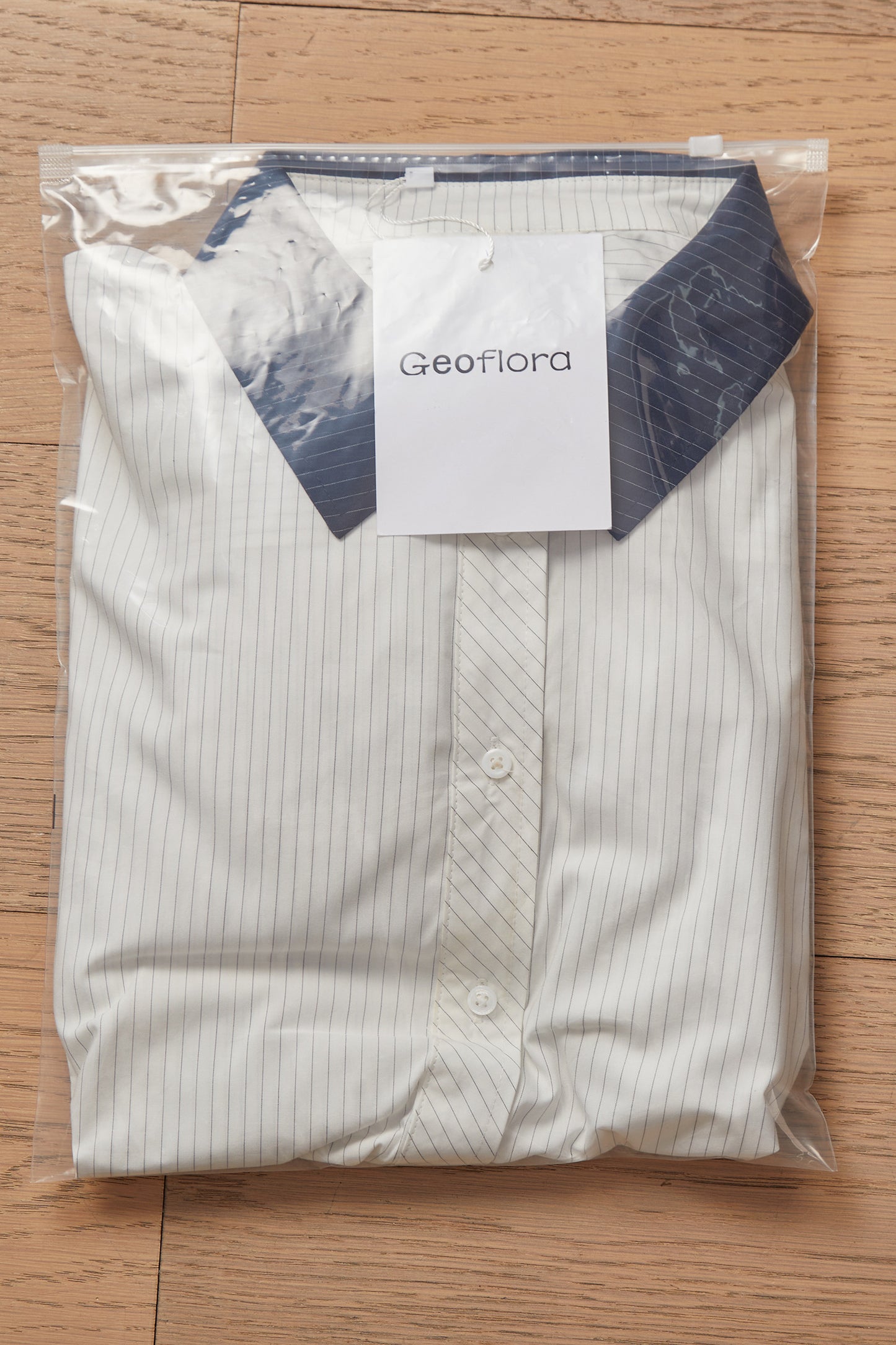 Geoflora White Sleeveless Peplum Blouse with Navy Collar - Casual Button-Down Drawstring Waist Top