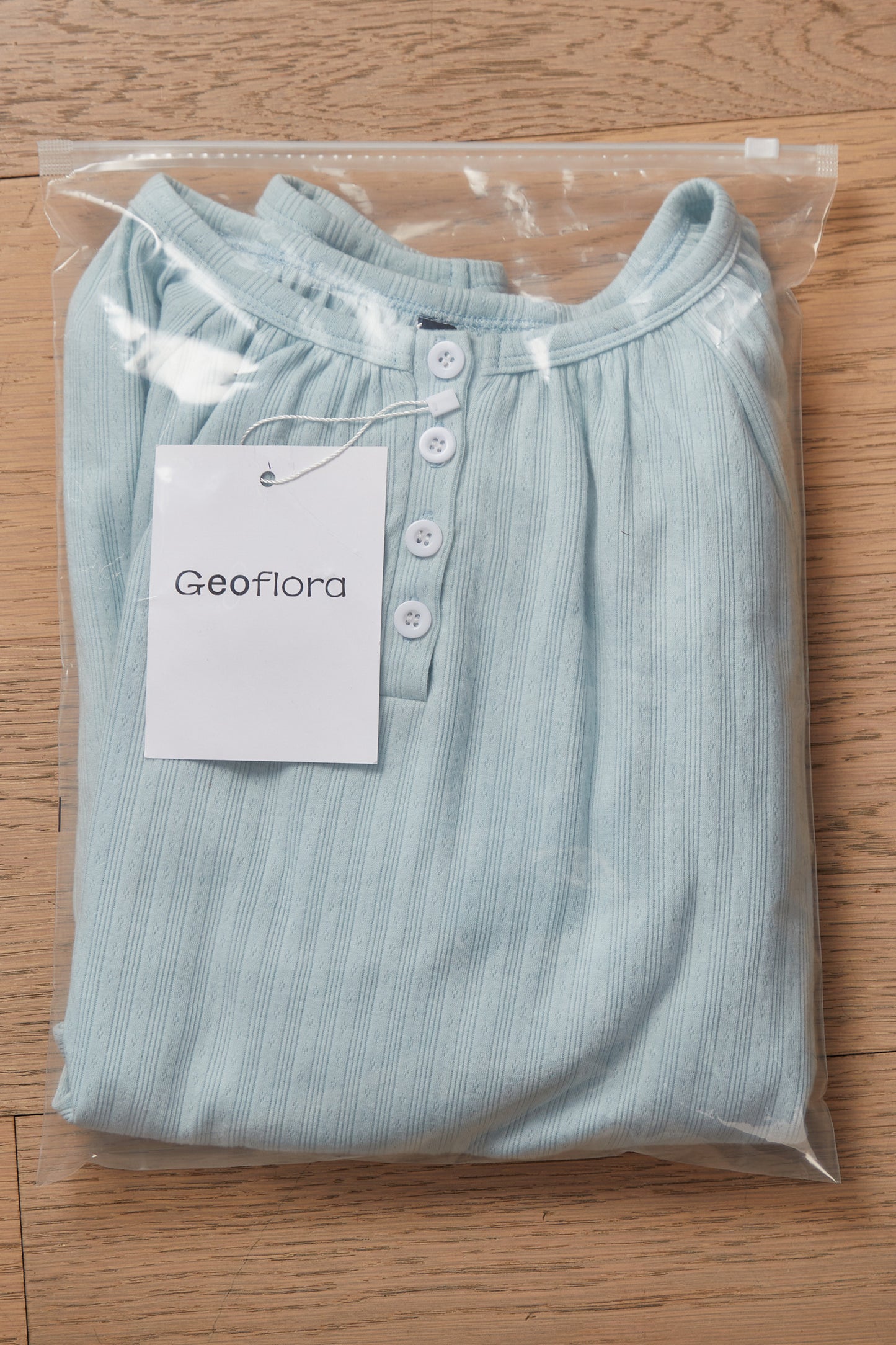 Geoflora Light Blue Ruffle Hem Long Sleeve Blouse - Casual Round Neck Textured Cotton Top